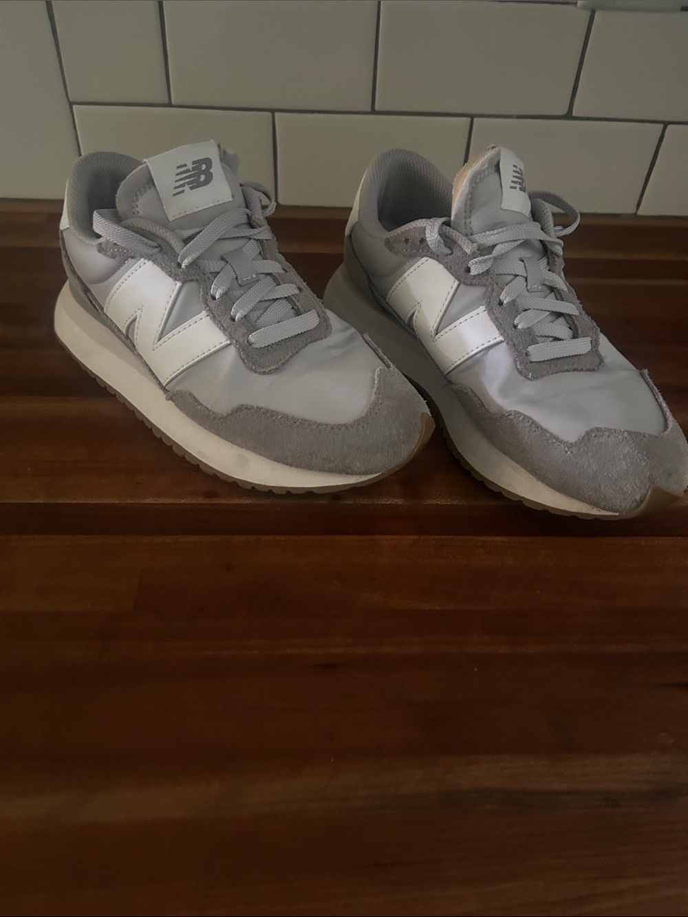 New Balance women’s 327 Sneaker in Light Gray and White